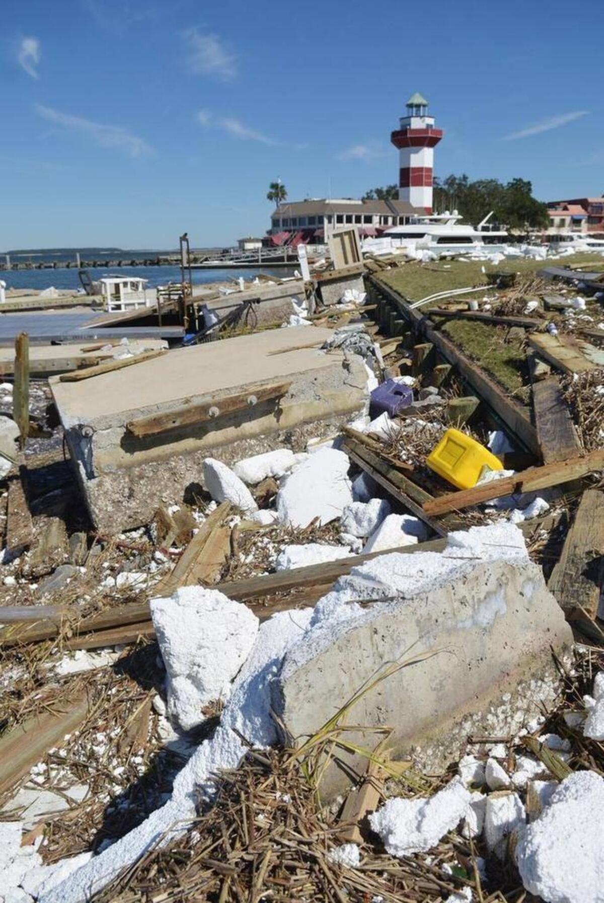 The iconic Harbour Town Lighthouse rises above the rubble left by Hurricane Matthew in this photo taken on Oct. 10, 2016. Matthew hit Hilton Head in the early morning hours of Saturday, Oct. 8, 2016.