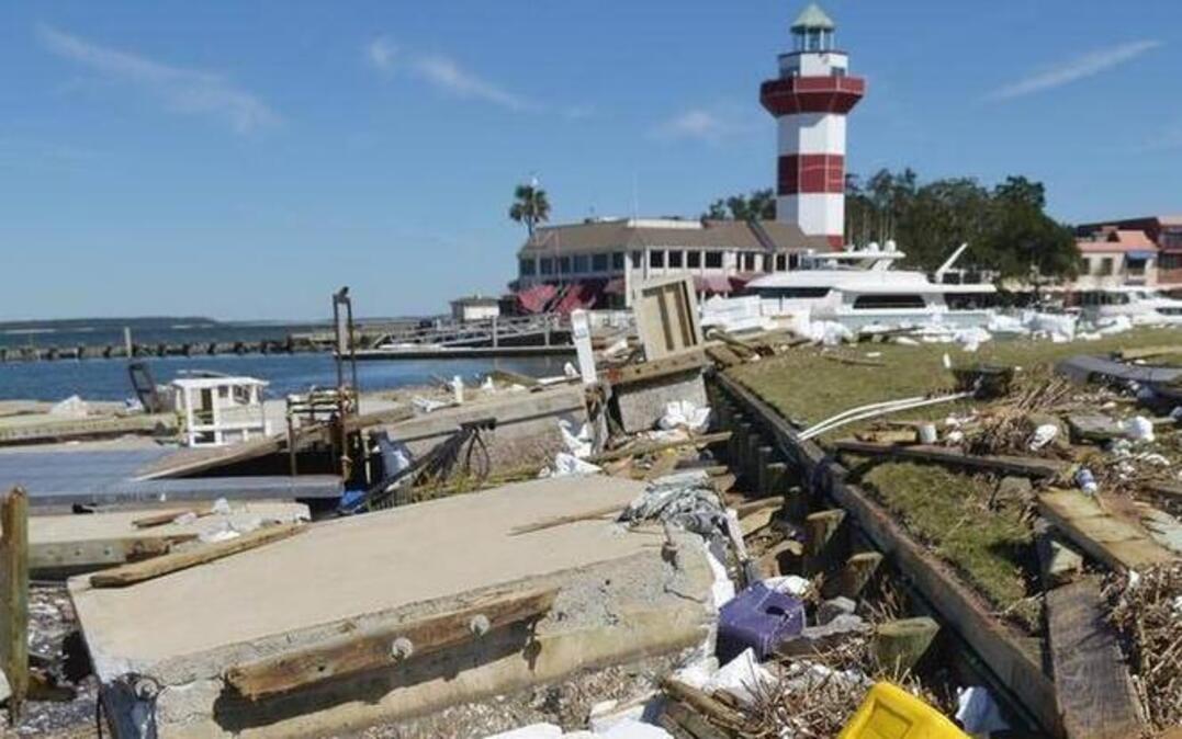 The iconic Harbour Town Lighthouse rises above the rubble left by Hurricane Matthew in this photo taken on Oct. 10, 2016. Matthew hit Hilton Head in the early morning hours of Saturday, Oct. 8, 2016.