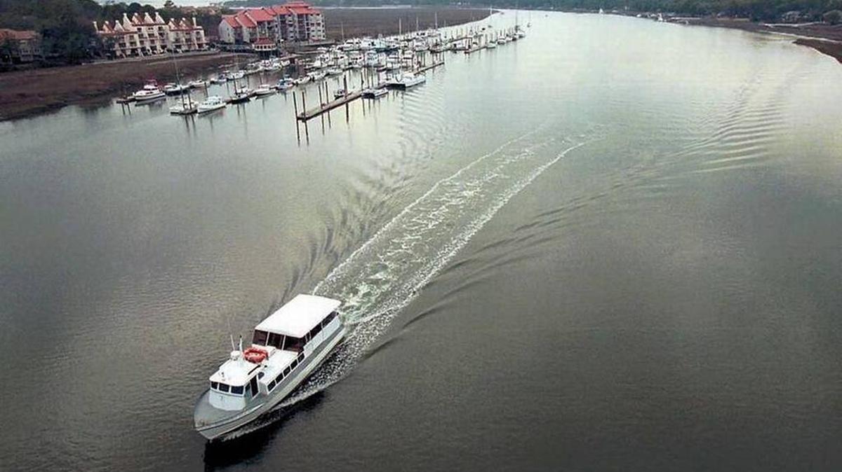 A ferry boat passes under the Charles E. Fraser Bridge on Hilton Head Island.