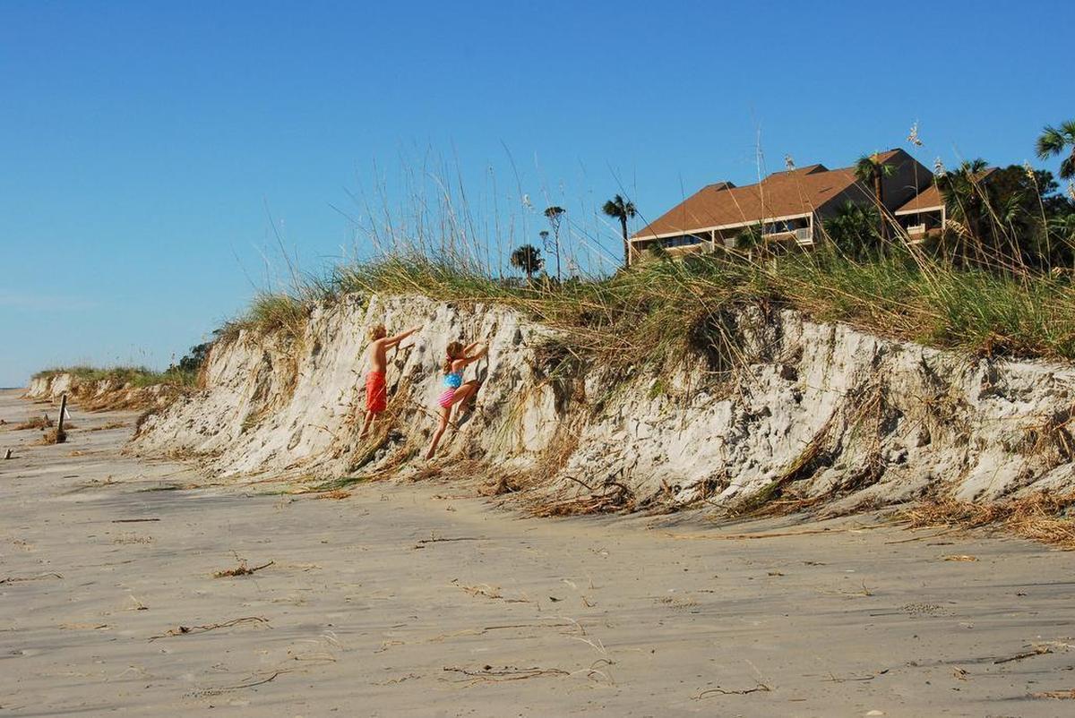 Children play near Villamere in Palmetto Dunes on Hilton Head Island, Oct. 9, 2016.