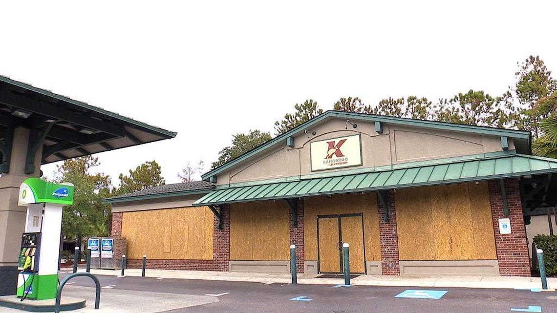 A gas station in the Coligny Beach area of Hilton Head Island boarded up Thursday, one of many local businesses shuttered for Hurricane Matthew.