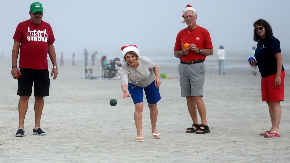 In this file photo taken on Dec. 25, 2015, residents and vacationers flocked to Hilton Head Island’s beach to enjoy the warm, but very foggy weather. Preliminary data recorded by the National Climatic Data Center recorded the high temperature at Marine Corps Air Station Beaufort at 79 degrees. The National Weather service lists 62.5 degrees as the average temperature for Savannah, Ga.