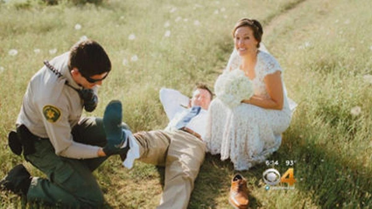 The groom receives treatment for a rattlesnake bite.