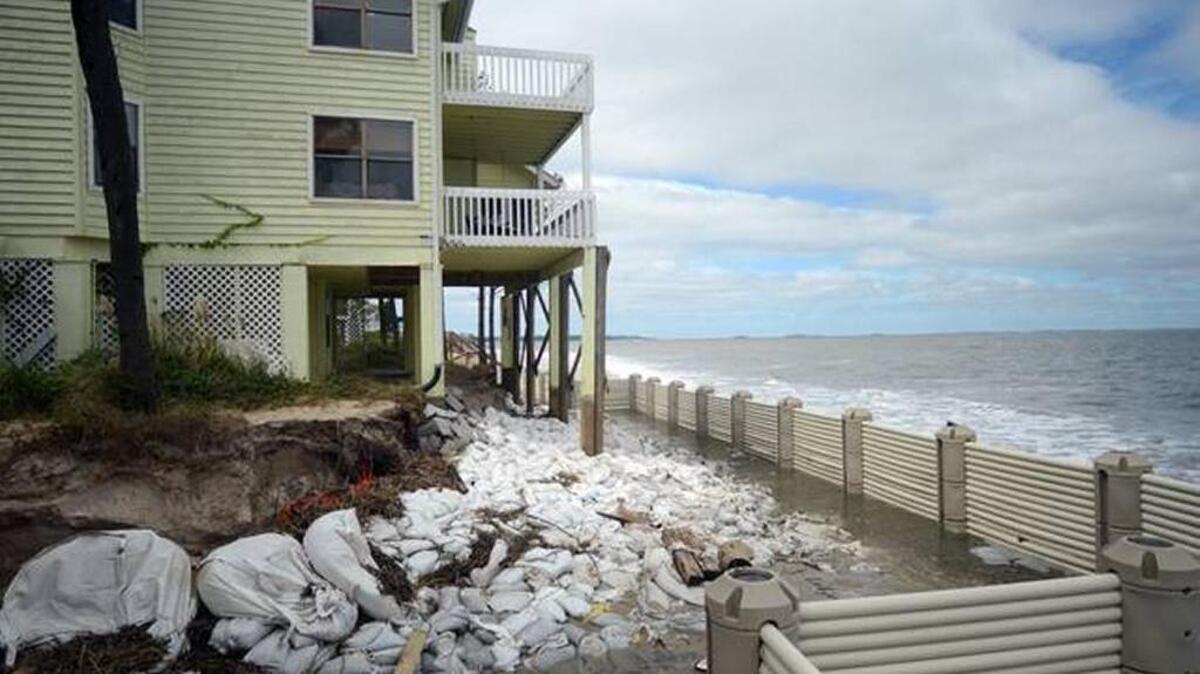 The back of a home with “wave-dissipation devices” in place on Harbor Island Oct. 6, 2015. Most of the beach behind the home was washed away by high tides and rough waves Oct. 3.