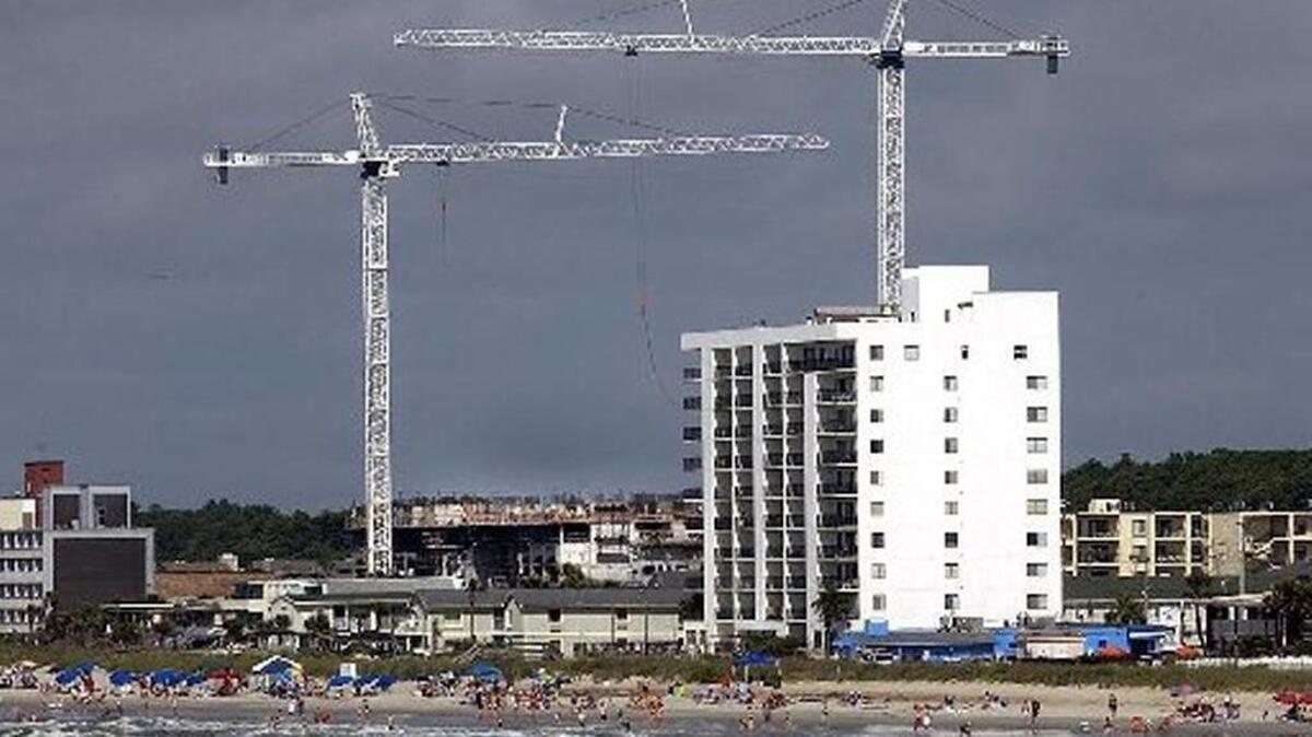 This towering condominium was built in 2006 on land freed from oceanfront building restrictions after taxpayers spent $20 million widening the beach at Cherry Grove, a section of North Myrtle Beach.