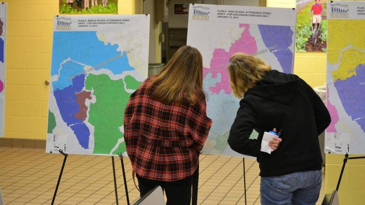 Parents examine attendance zone maps during a Jan. 23, 2014, meeting about attendances zones in the Beaufort County School District.