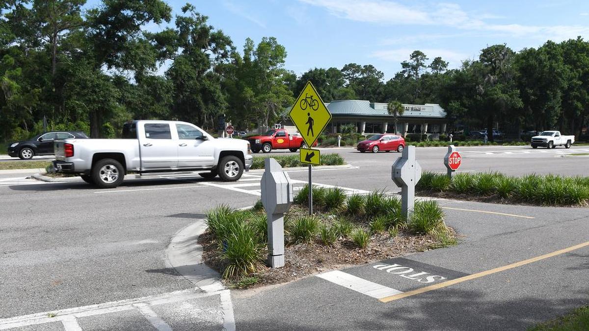 Traffic on William Hilton Parkway moves past Yacht Cove Drive, the scene of a fatal accident that claimed the life of 11-year-old Charli Jorden Bobinchuck who was struck by a car in the crosswalk.