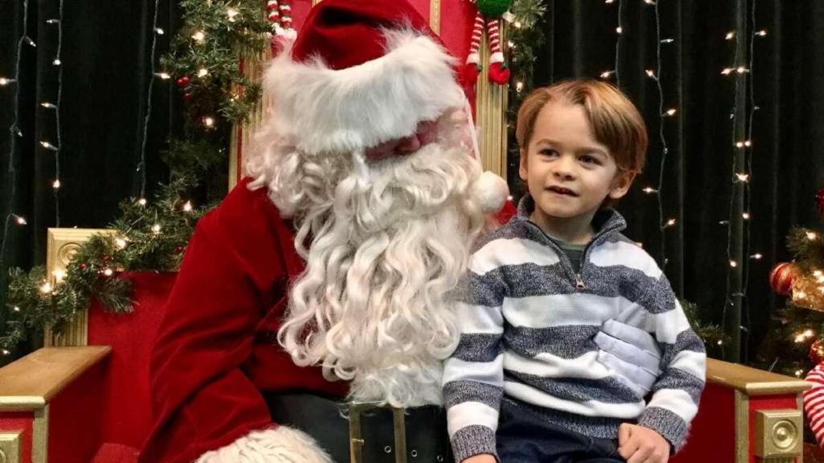 Wyatt Lucas, 5, of Bluffton, reacts to some wisdom from Santa Claus during a Meet Santa event earlier this month at Bluffton Town Hall.