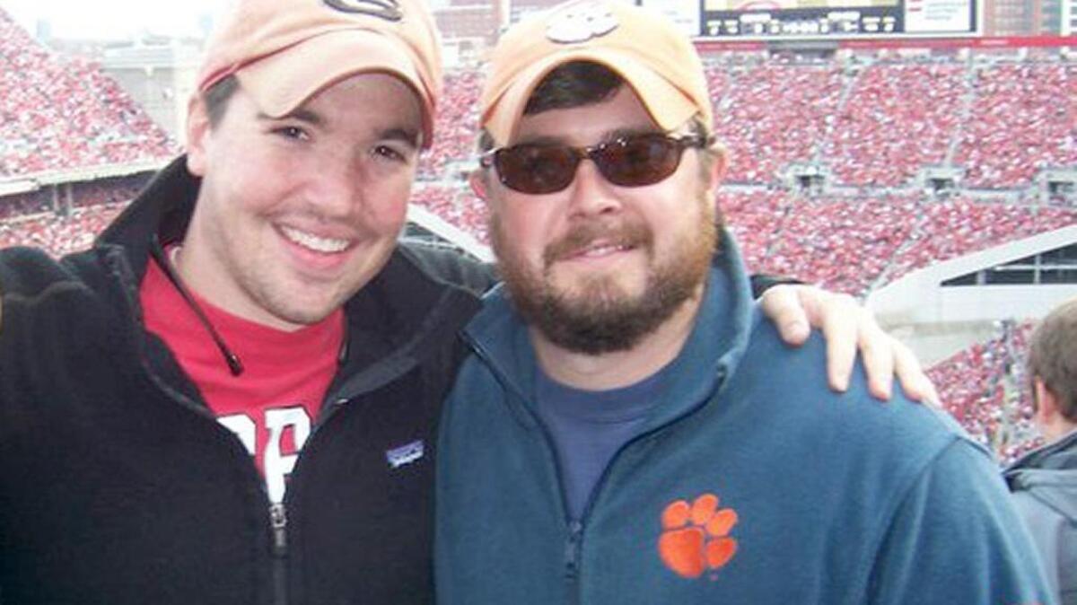 The author, right, with his best friend, Abe Saunders, at an Ohio State Buckeyes football game in fall 2011 at Ohio Stadium in Columbus, Ohio.