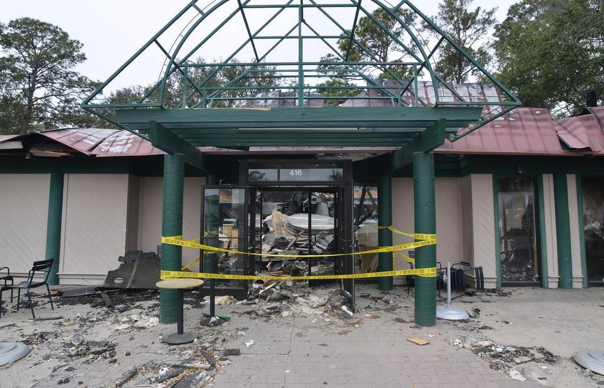 The Starbucks coffee shop at Sea Turtle Marketplace, photographed on Thursday, has changed little since it burnt down on Jan. 21.