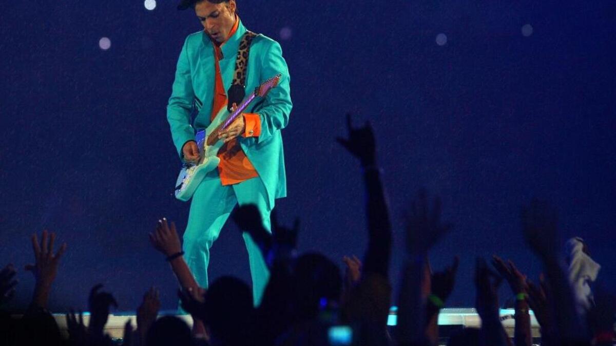Prince performs in the halftime show at the Super Bowl in Miami Gardens, Fla., in this file photo from Feb. 4, 2007.