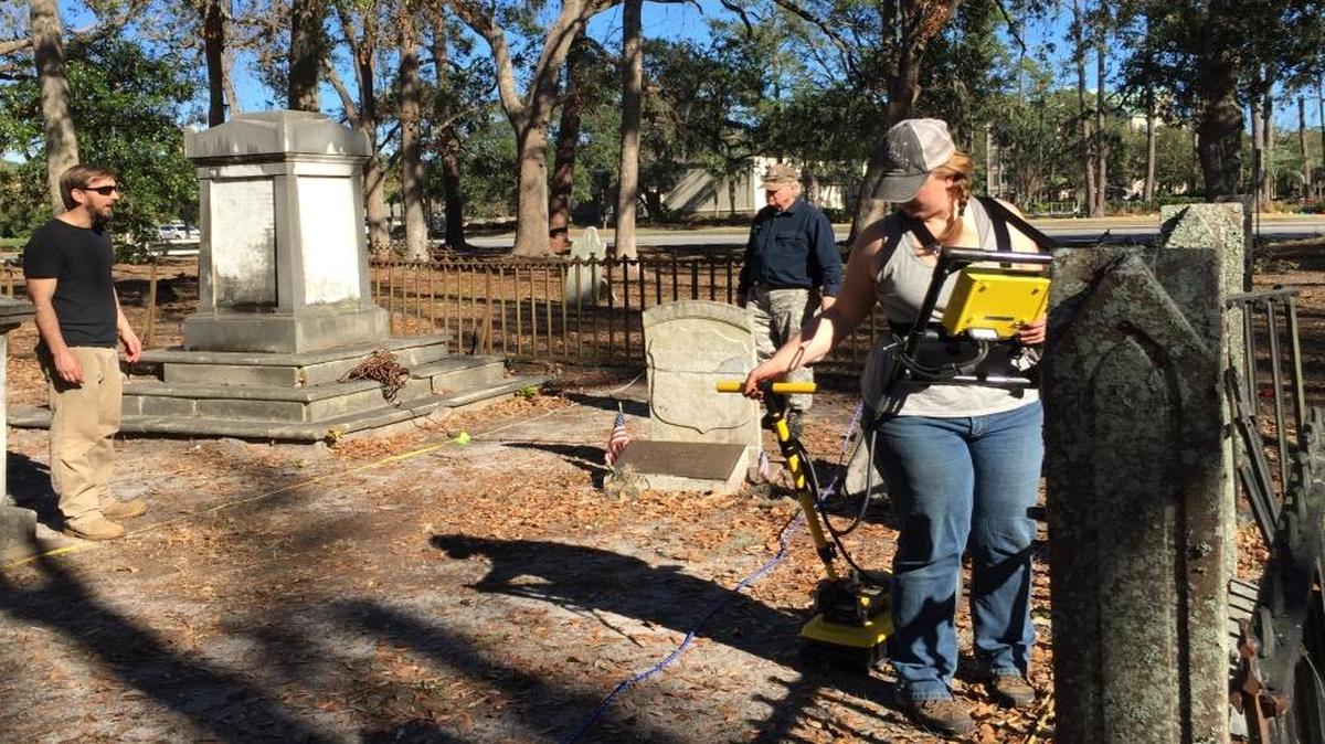 Doctoral student Katie Seeber, right, scans a portion of the Zion Chapel of Ease cemetery on Hilton Head Island with assistance from her professor Matthew Sanger of Binghamton University in New York, left, and David Gordon, president of the S.C. Archaelogical Society’s Hilton Head chapter.