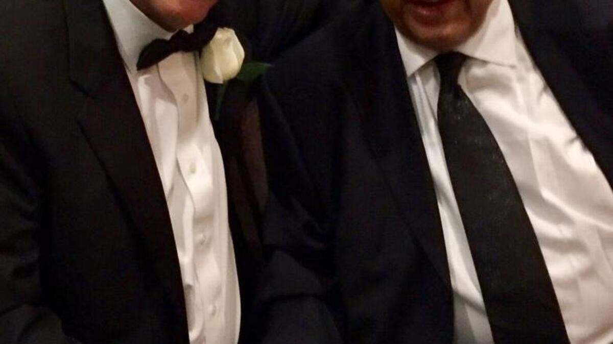 Ambassador Andrew Young poses with David Lauderdale on the podium at the Penn Center 1862 Circle Induction Gala on Saturday, April 22, 2017, at the Sonesta Resort on Hilton Head Island.