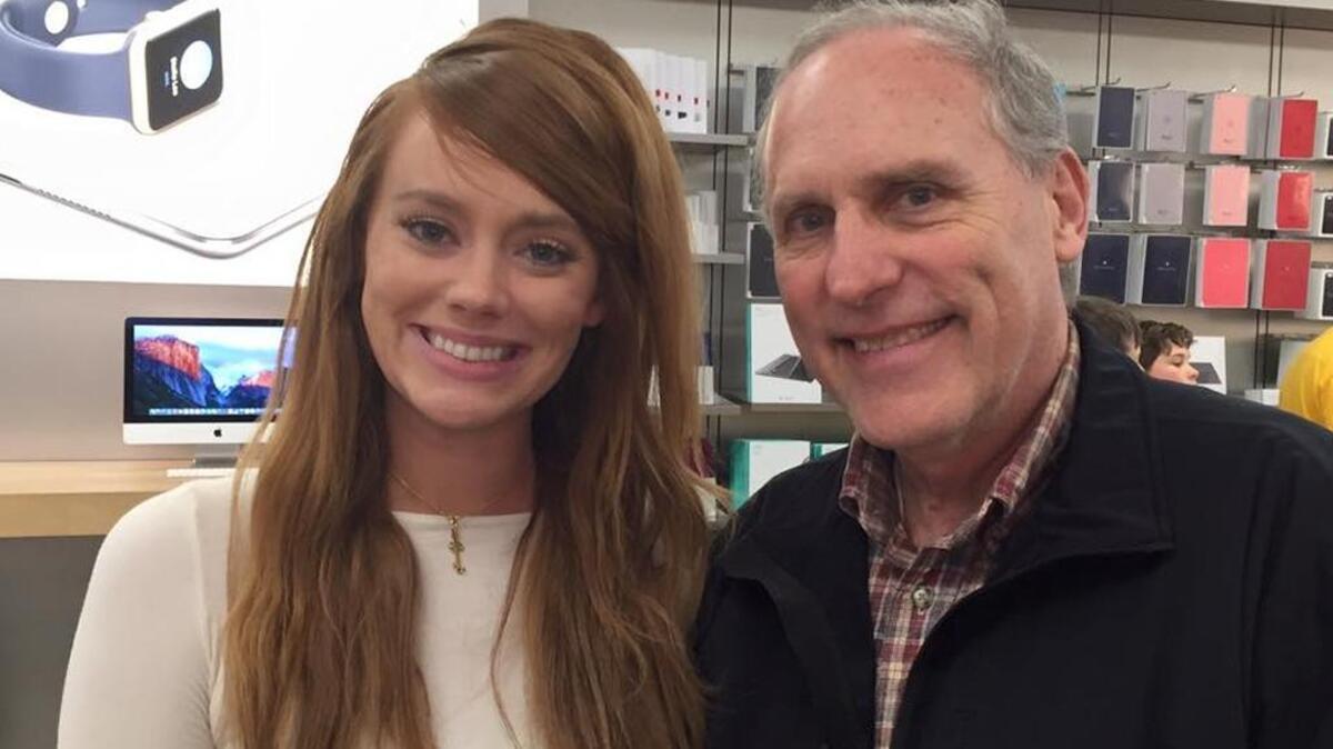 Kathryn Dennis, star of reality TV show “Southern Charm,” with David Lauderdale in the Apple store in Charleston, Feb. 24, 2016.