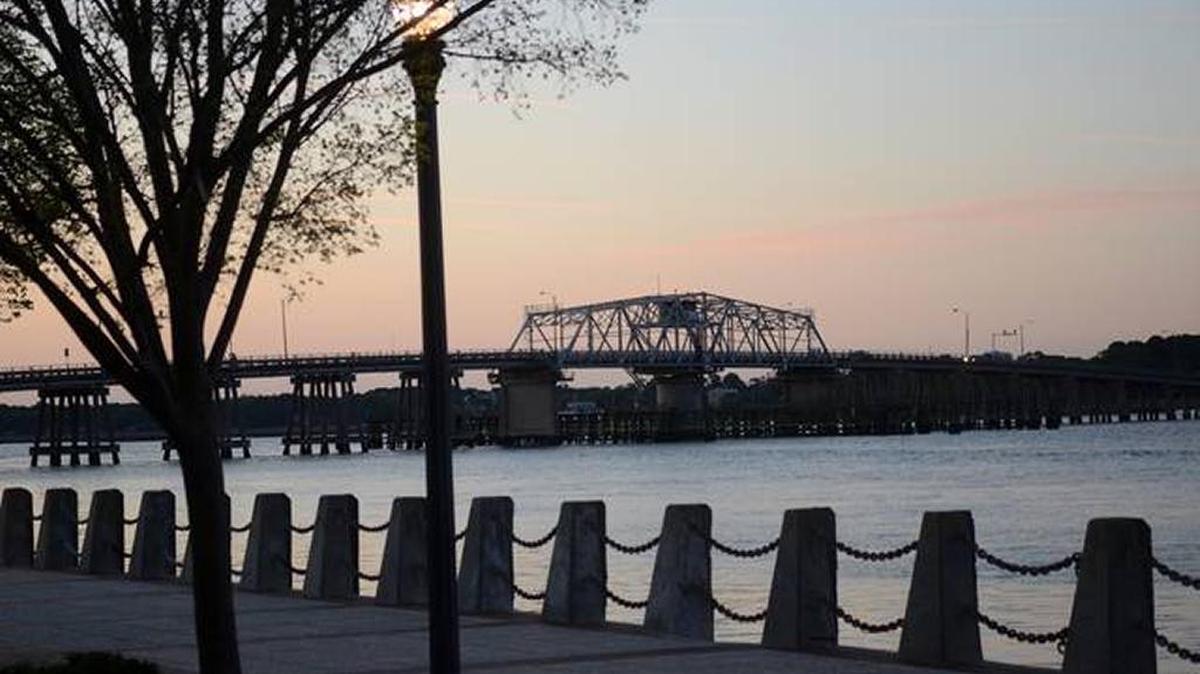 The swing-span Woods Memorial Bridge in downtown Beaufort as seen from the Henry C. Chambers Waterfront Park in this file photo. A woman was rescued after jumping from the bridge Wednesday evening, firefighters said.