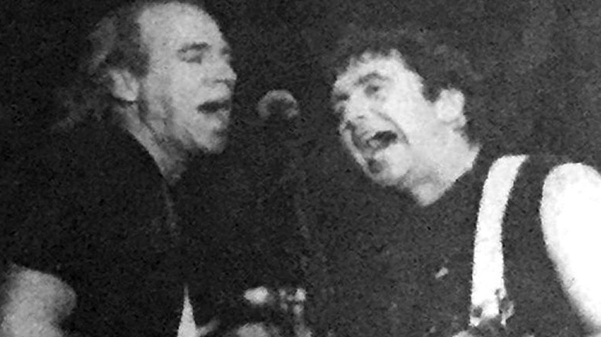Jimmy Buffett, left, sings with Little Feat’s Craig Fuller at Hilton Head Island High School on Friday, July 20, 1990.