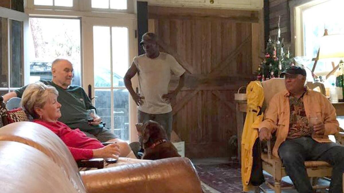 Charlie Golson, second from left, in the new “cook shed” at home in Bluffton with family and friends on Christmas Day.