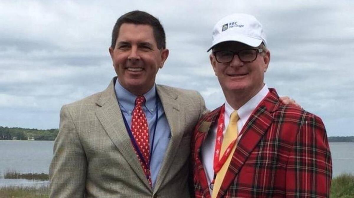 Keller Kissam, left, poses with Charlie Rountree III after giving the invocation at the opening ceremony of the RBC Heritage Presented by Boeing on April 11, 2016.