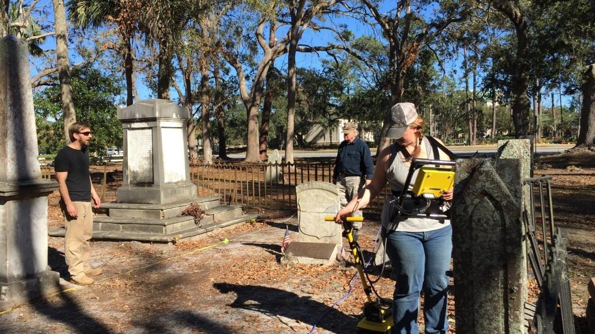 Doctoral student Katie Seeber, right, scans a portion of the Zion Chapel of Ease Cemetery on Hilton Head Island with assistance from her professor Matthew Sanger of Binghamton University in New York, left, and David Gordon, president of the S.C. Archaelogical Society’s Hilton Head chapter, in January 2017.