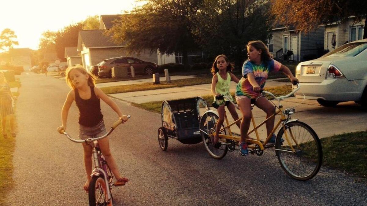 Children in Jay Doty’s Bluffton neighborhood love to ride the restored 1973 Schwinn tandem bike.