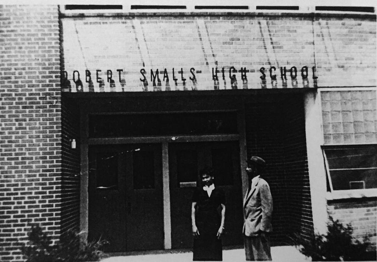 In this undated photo, W. Kent Alston stands in front of Beaufort’s Robert Smalls High School with his secretary, Eleanor Hazel.