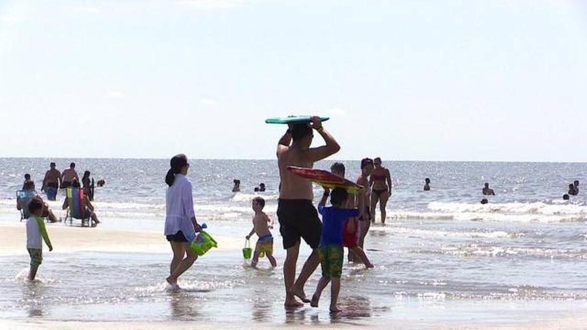 Heat advisories make the Hilton Head Island beach the place to be. But staying too long can impact physical health, experts warn.