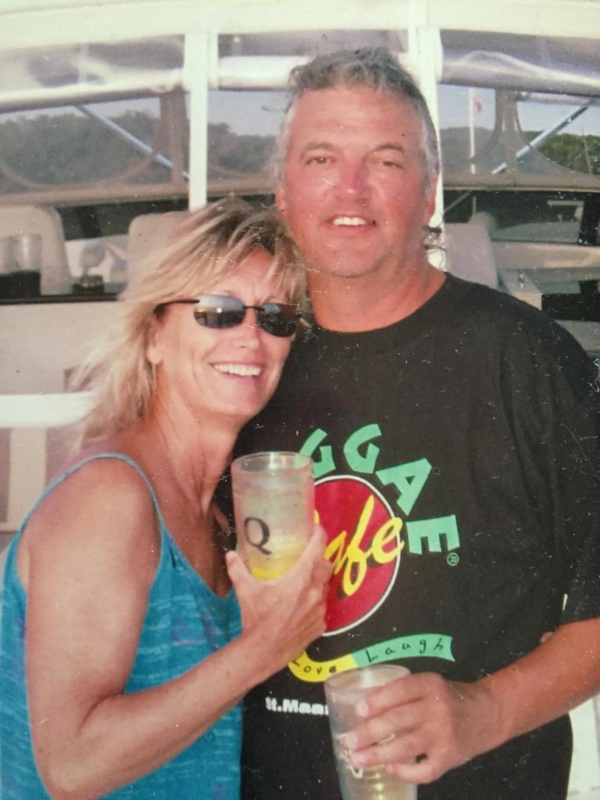 Joe and Lisa Rice relax aboard a boat.