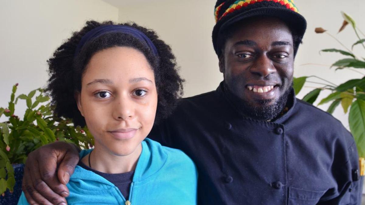 David Vincent Young is photographed on Friday with his daughter, Imani May Young, 16, who suffers from Lyme disease.
