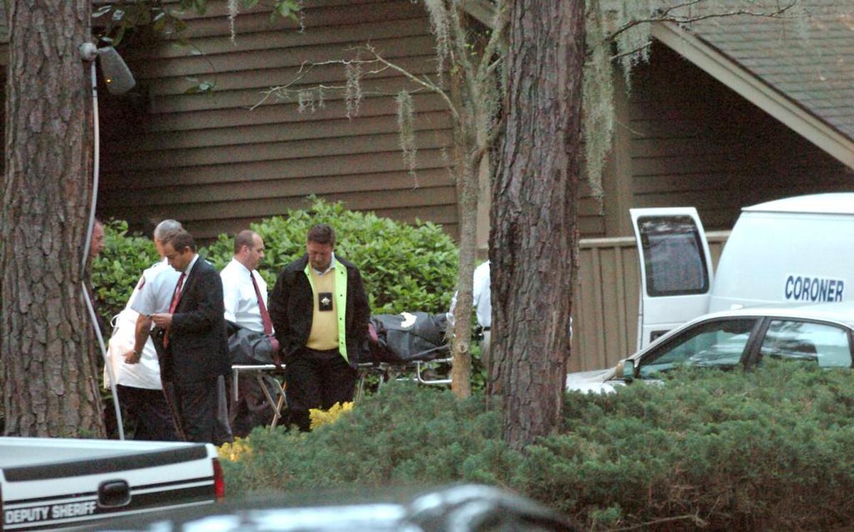 Beaufort County investigators remove the body of Dennis Ray Gerwing from a Sea Pines Villa who was found dead, apparently by suicide on March 11, 2008.