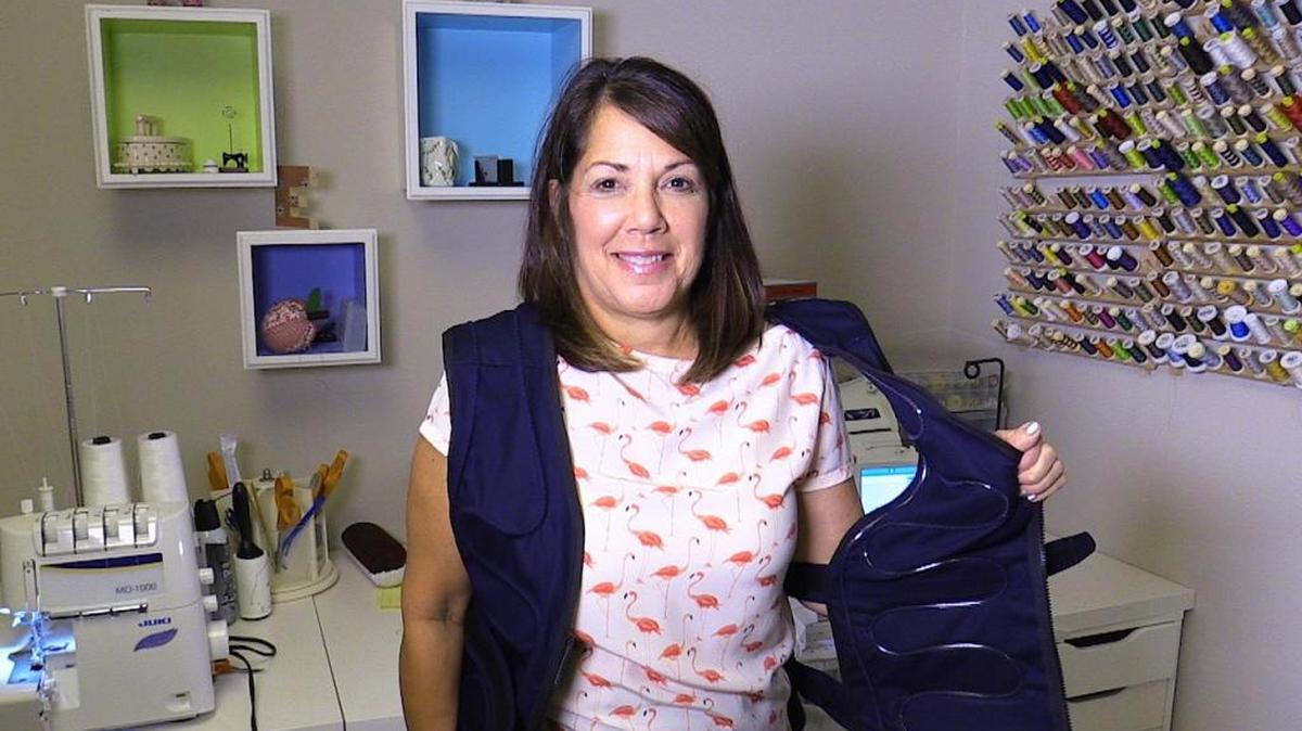 Master sewer Carla Student, of Lady’s Island, shows one of her works, a “Cool Flow” vest, while in her home’s sewing room on Tuesday, July 26, 2016. The vest is used by surgeons, among others. Student is an independent seamstress and product developer for Ohio-based Polar Products, and also runs her own company, Carla’s Creations.