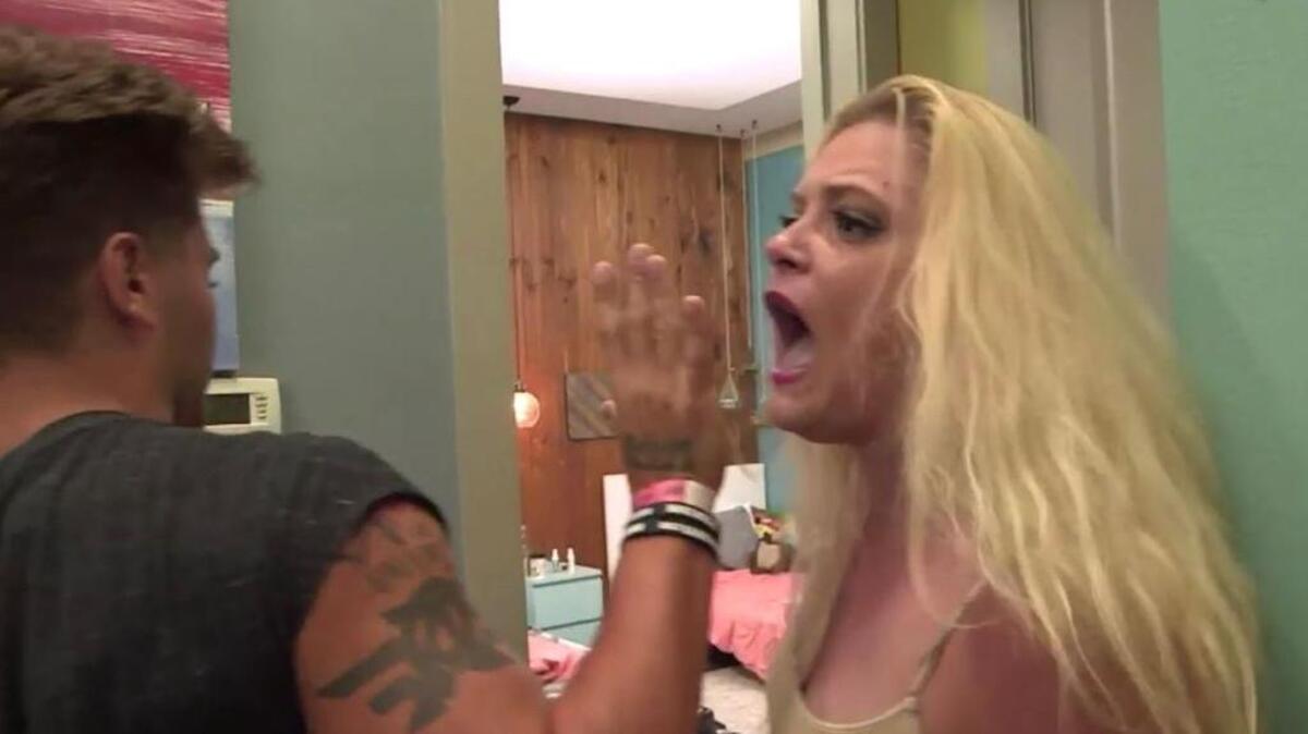 Gus Smyrnios, left, holds back Aimee Hall in the finale of “MTV’s Floribama Shore.”