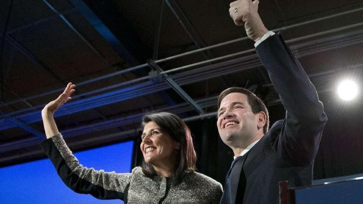 Gov. Nikki Haley and then-GOP presidential candidate Sen. Marco Rubio, R-Fla, wave to the crowd after speaking at an election-night rally Saturday, Feb. 20, 2016, in Columbia. Haley endorsed Rubio prior to the state presidential preference primary, which was won handily by Donald Trump.
