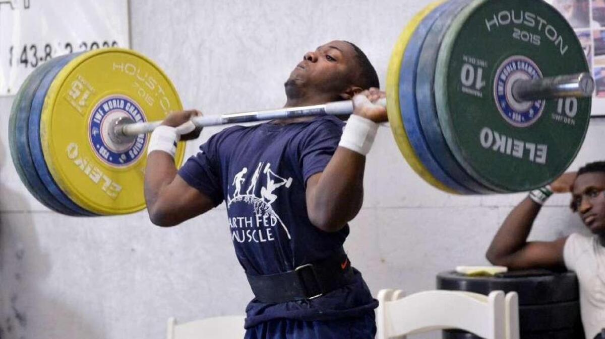 CJ Cummings lifts 150 kilos at CrossFit Beaufort during his daily workout on Monday, April 4, 2016 as he prepared for the Olympic trials in May.