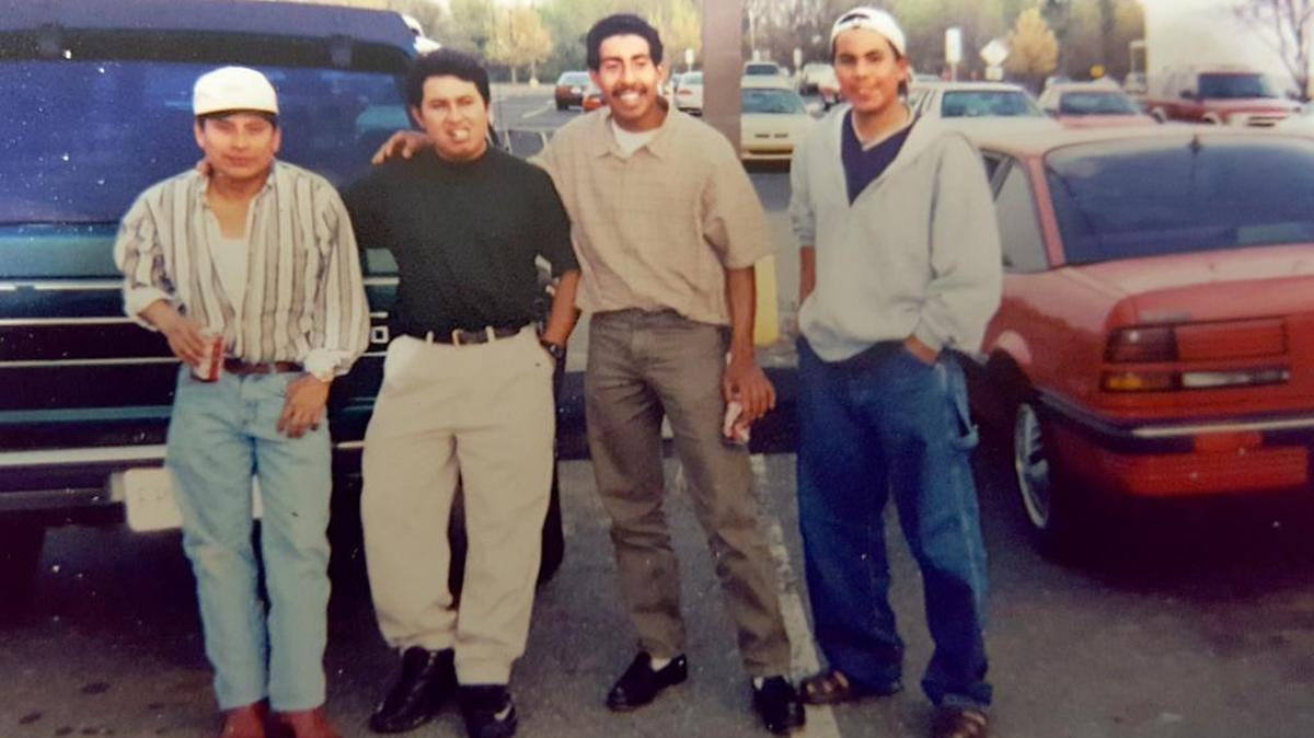 Mario Martinez, second from left, poses with friends.