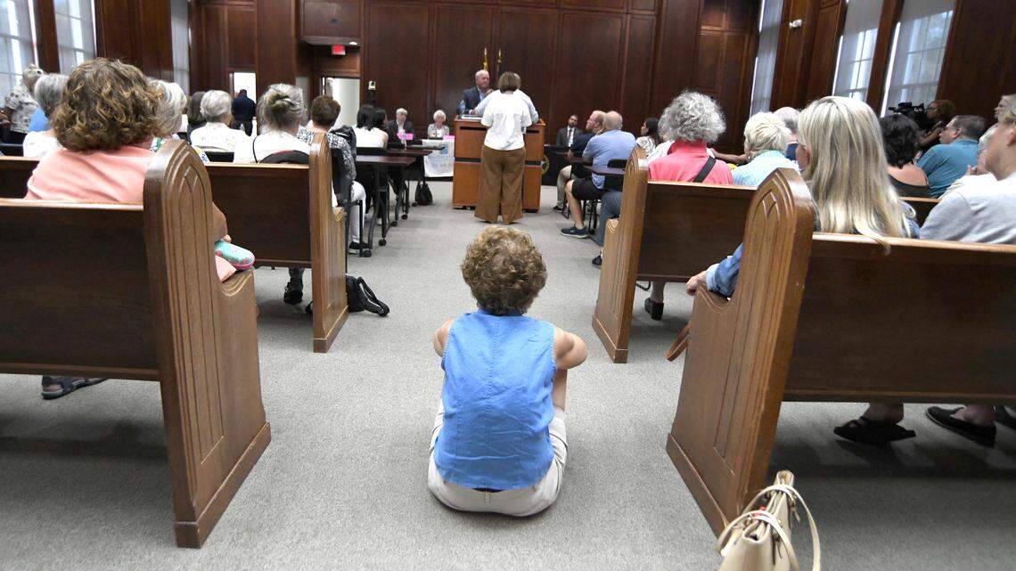 It was standing (and sitting) room only at the meeting with Beaufort County Sheriff P.J. Tanner Tuesday night. After making her remarks and asking questions about the sheriff’s plan for adopting an updated immigration policy, Carter Hoyt of Ladys Island found a patch of carpet on the floor so she could hear the proceedings.