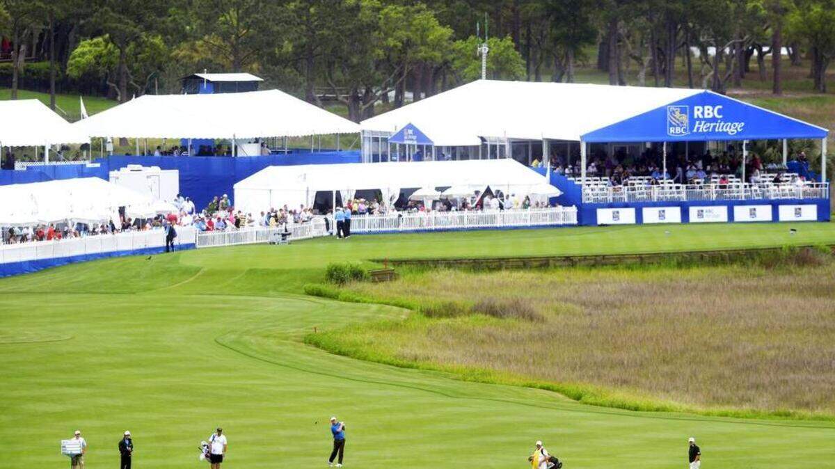 John Huh, Dudley Hart, and Billy Hurley III, are seen making their way down the 18th fairway during the 2nd round of the RBC Heritage Presented by Boeing on April 17th, 2015, at Harbour Town Golf Links in Sea Pines on Hilton Head Island S.C.