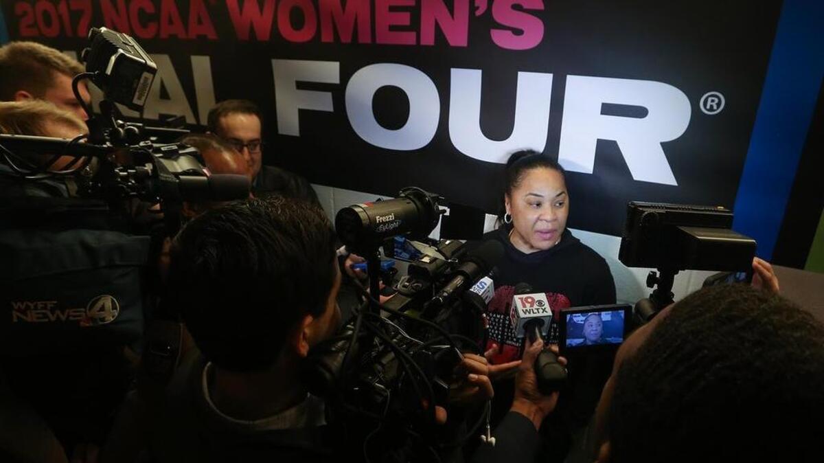 South Carolina coach Dawn Staley in interviewed outside the locker room at the American Airlines Arena in Dallas, Texas, on Saturday. USC beat Stanford 62-53 and will play Mississippi State for the National Championship.