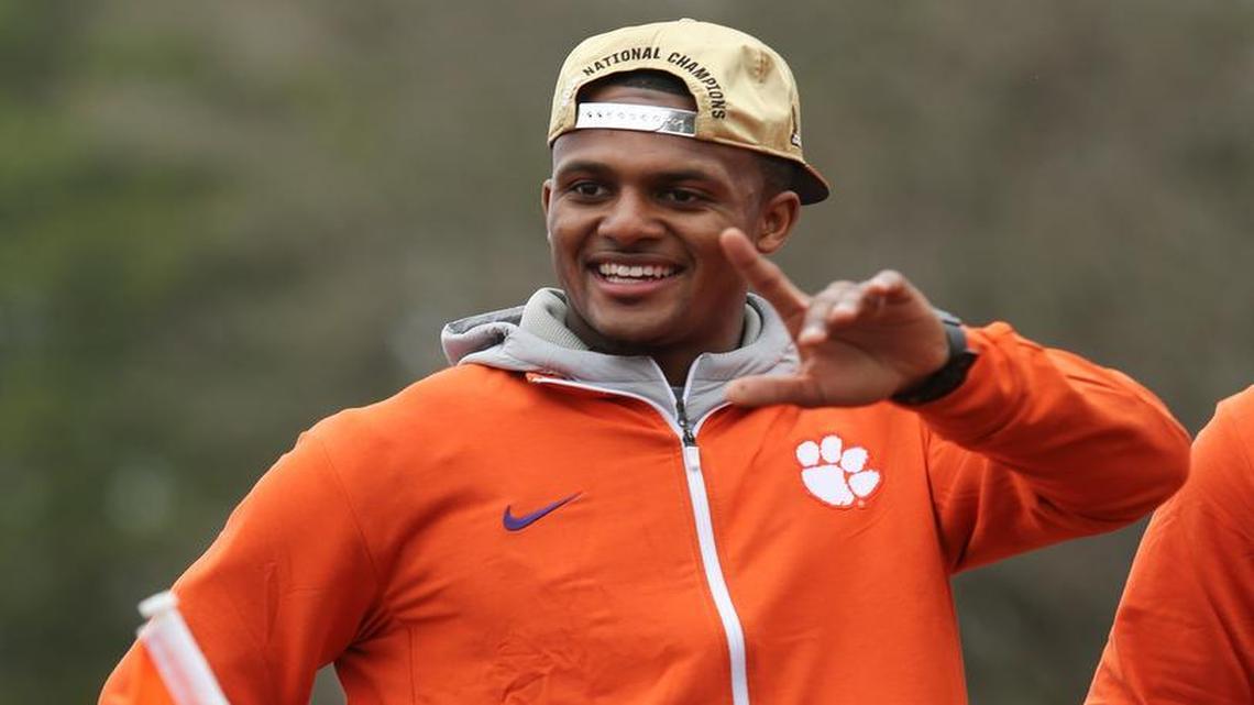 Clemson Tigers quarterback Deshaun Watson greets fans during the College Football Playoff National Championship celebration parade.