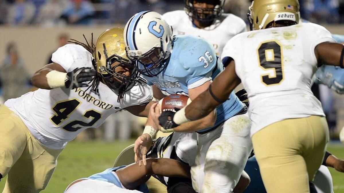 Wofford advanced to the second round of the NCAA Division I Football Championship playoffs to face the number 6 national seed The Citadel. The game was played on Saturday, Dec. 3, 2016 at Johnson Hagood Stadium in Charleston. Wofford's Datavious Wilson (42) and a host of teammates take down The Citadel's Tyler Renew (36) on a play.