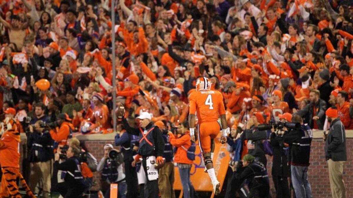 Clemson Tigers quarterback Deshaun Watson (4) celebrates a touchdown pass in the first quarter against South Carolina