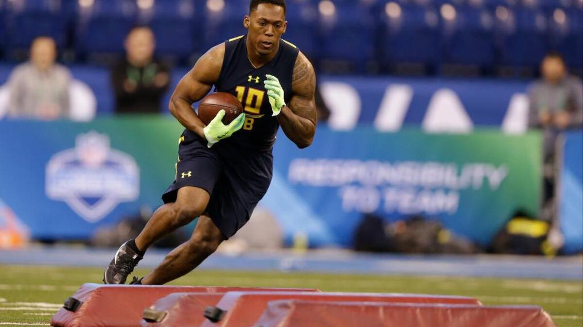 Clemson running back Wayne Gallman runs a drill at the NFL football scouting combine in Indianapolis.