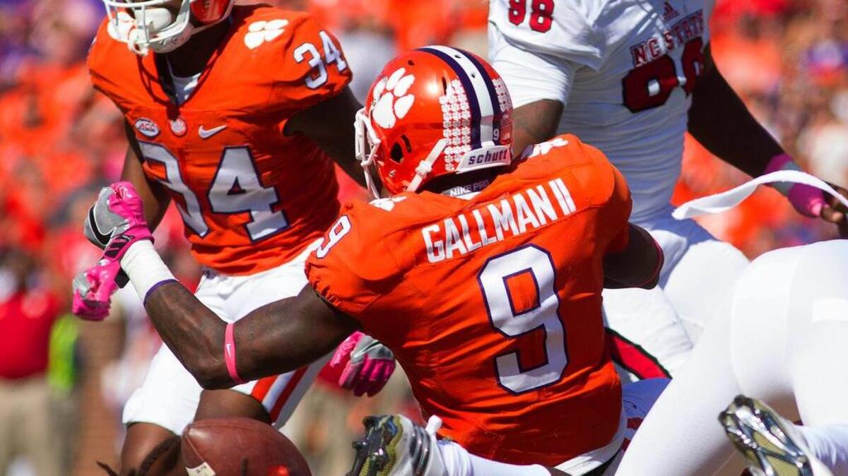 Clemson running back Wayne Gallman fumbles for one of Clemson’s four turnovers Saturday against N.C. State.