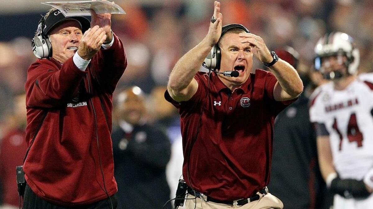 Shawn Elliott, right, has communicated with Steve Spurrier since taking the Georgia State job.