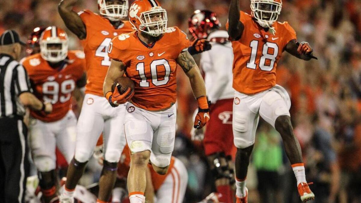 Clemson linebacker Ben Boulware comes up with a Louisville fumble that set up a touchdown drive in the second quarter of the Tigers’ thrilling victory over the Cardinals late Saturday.