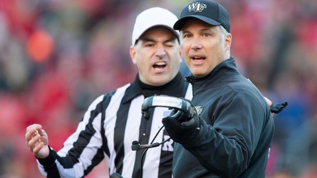 Wake Forest Demon Deacons head coach Dave Clawson argues a call with referee Duane Heydt during a game earlier this season. Clemson fans are unhappy with Heydt and his crew for some calls in the Tigers’ game vs. Pitt on Saturday.