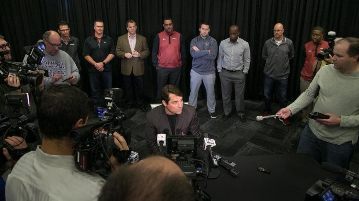 South Carolina head football coach Will Muschamp and his new USC assistant football coaches