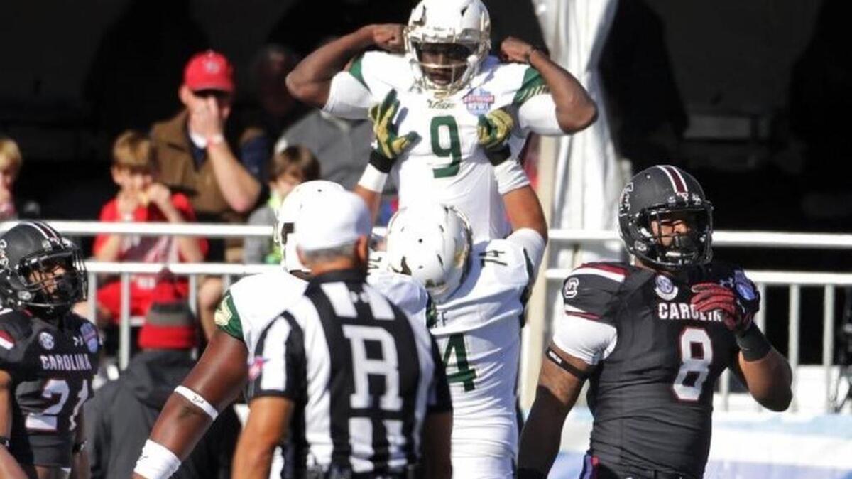 South Florida Bulls quarterback Quinton Flowers (9) celebrates a touchdown in front of a dejected South Carolina defense in the first half of the Birmingham Bowl game at Legion Field in Birmingham, AL, Thursday, December 29, 2016.