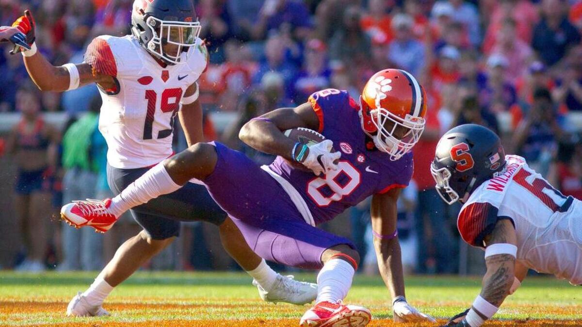 Clemson Tigers wide receiver Deon Cain (8) makes a reception Saturday against the Syracuse Orange at Clemson Memorial Stadium.