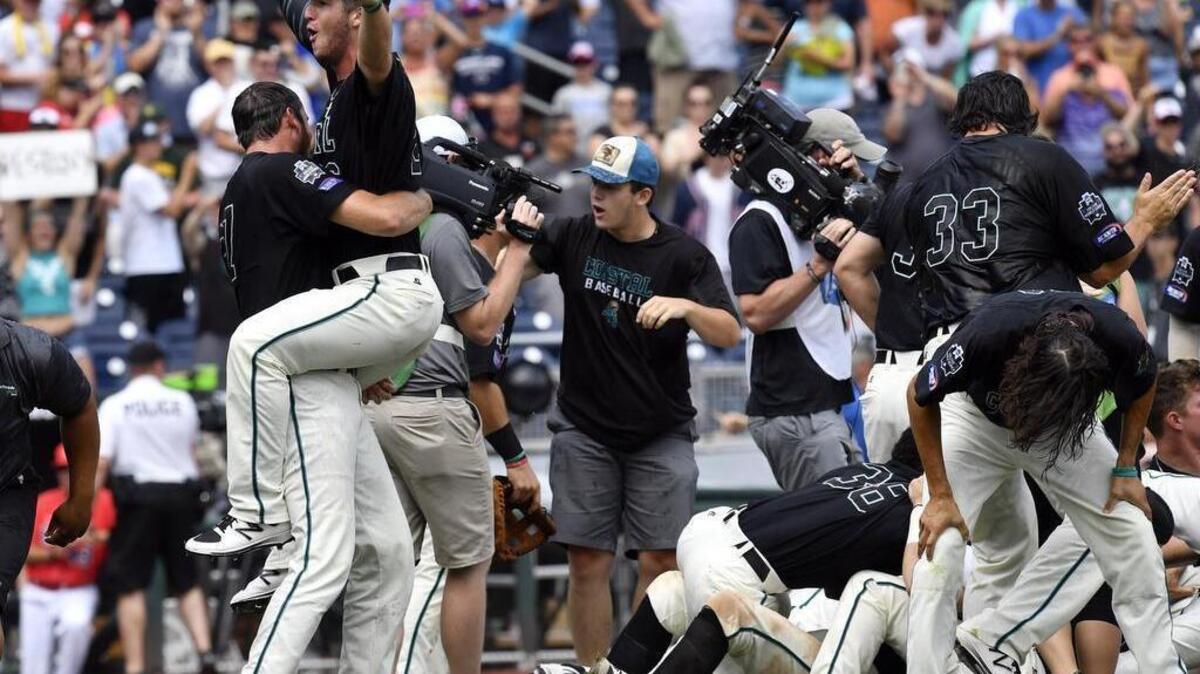 Coastal Carolina celebrates winning the College World Series title over Arizona, 4-3, Thursday afternoon.