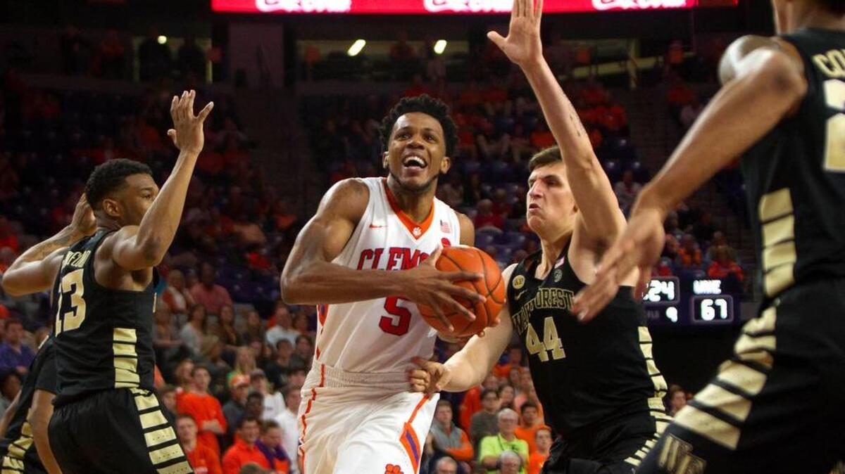 Clemson’s Jaron Blossomgame drives to the basket for two of his 17 points.